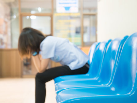 girl is waiting in a hospital