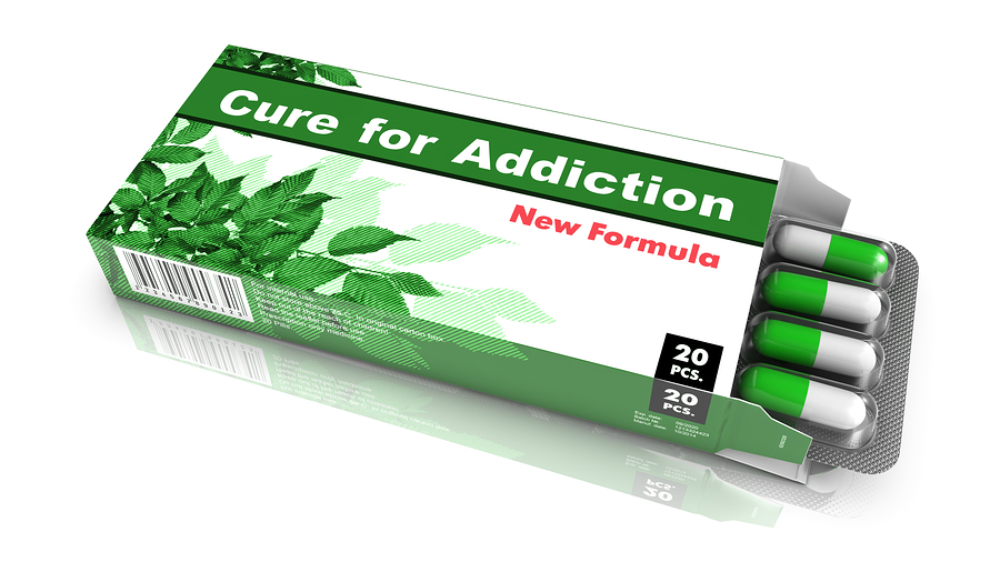 Cure for Addiction- Green Open Blister Pack Tablets Isolated on White.